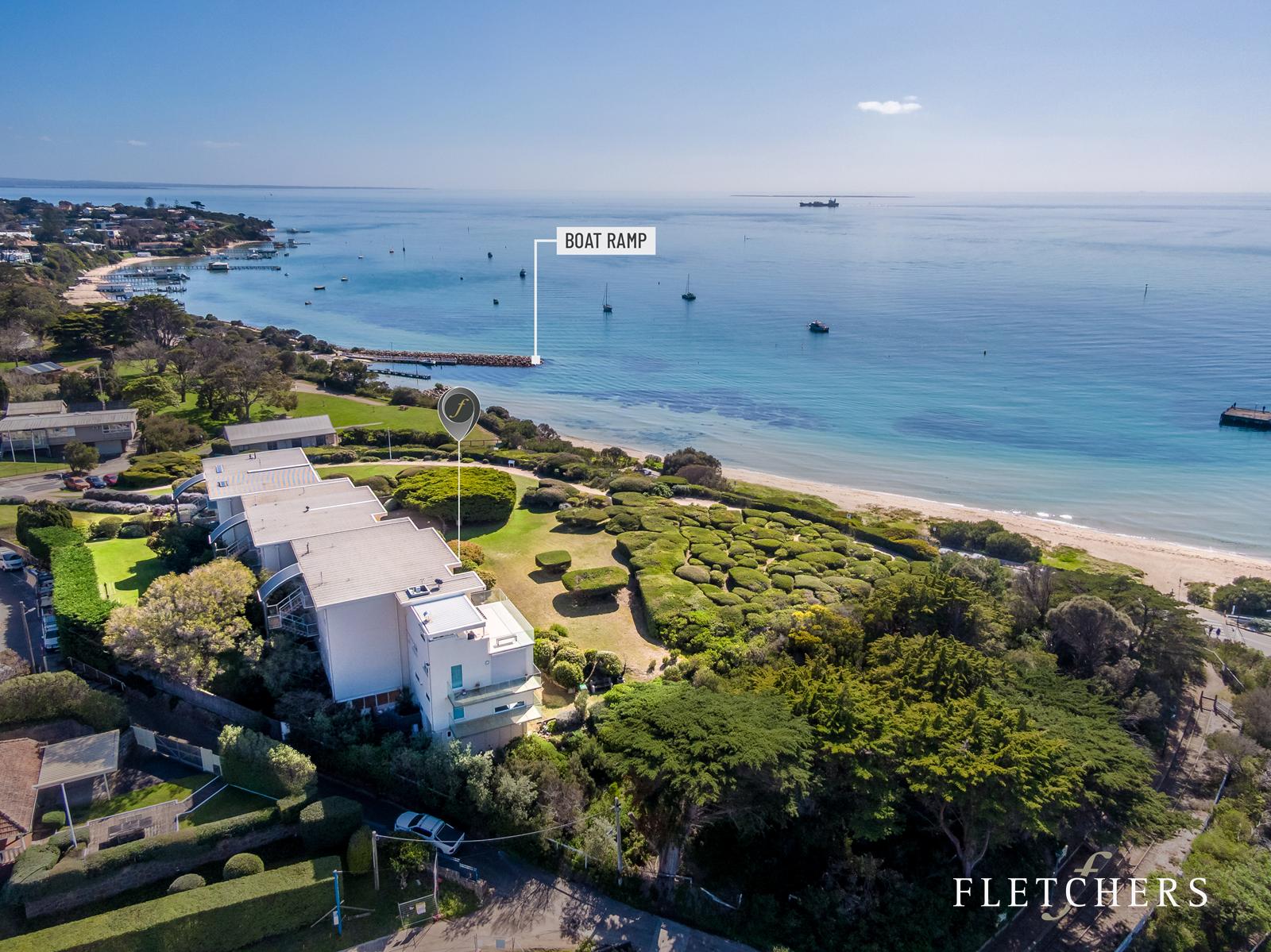 Aerial view of apartments above the foreshore