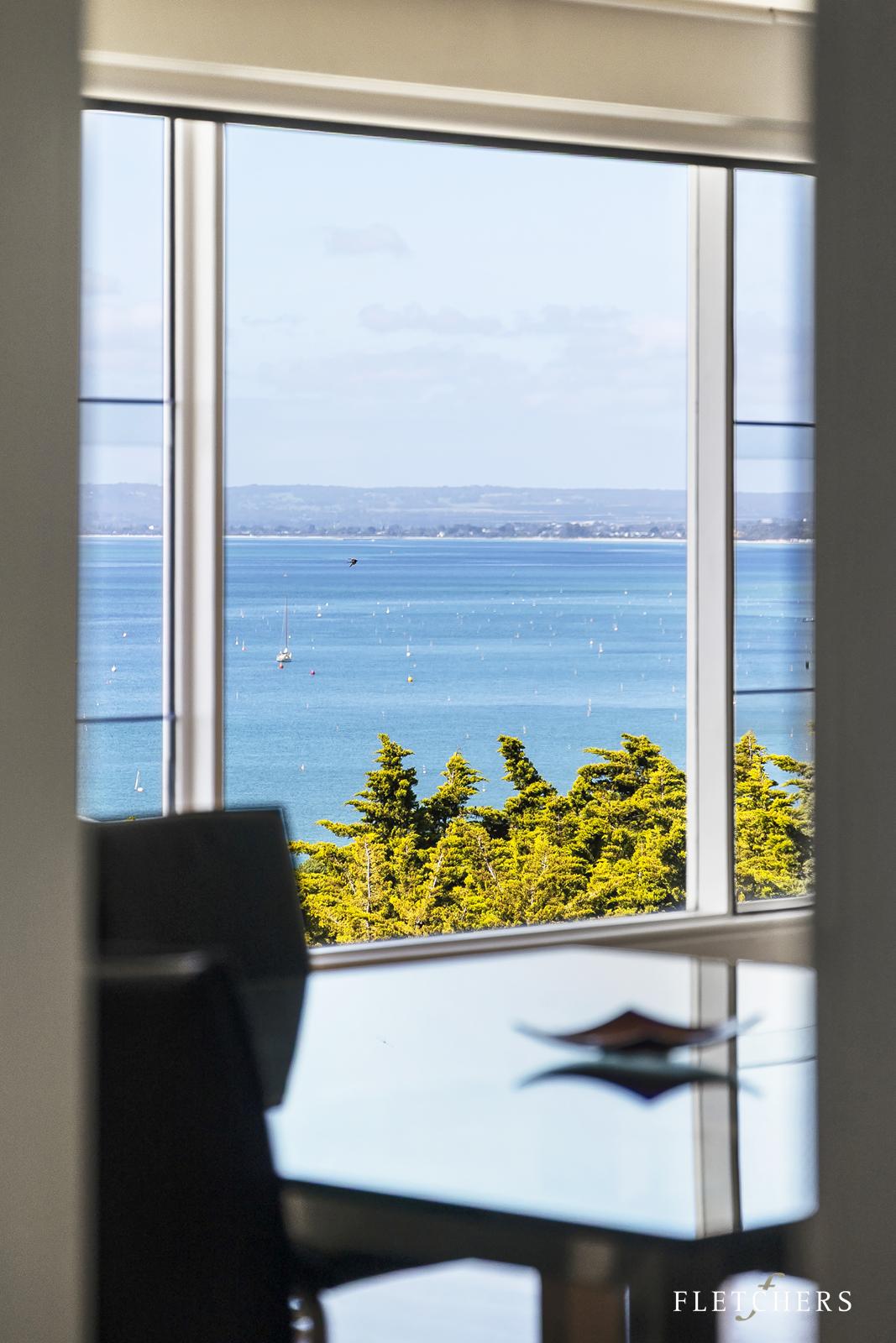 Interior window framing water view